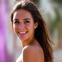 Portrait of Sarah, a wellness travel blogger, smiling.